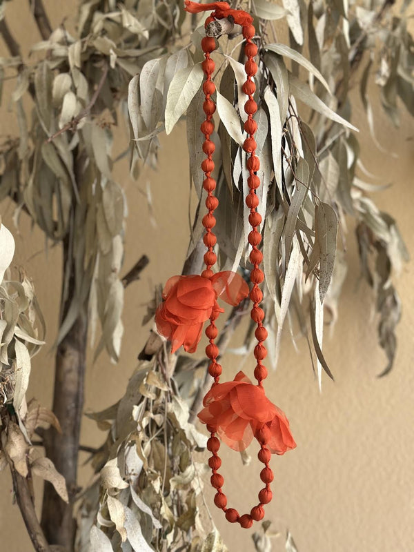 COLLAR FLORECITAS NARANJA