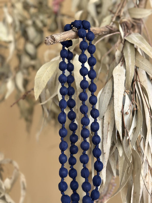 COLLAR BOLITAS AZUL MARINO