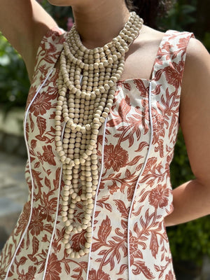 COLLAR CASCADA COLOR HUESO